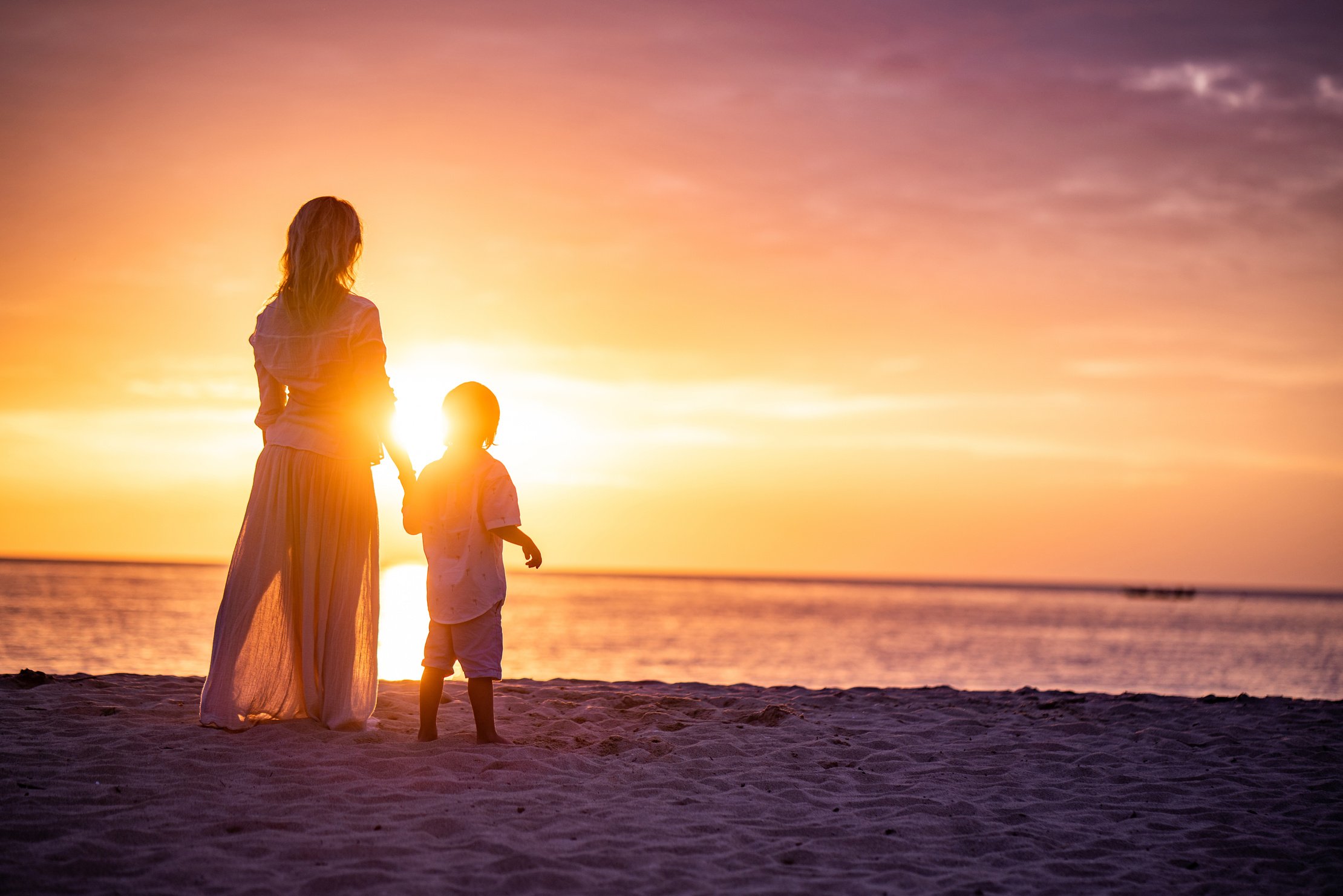 mom and son beaches and sunset